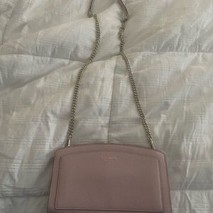 Pink crossbody Kate Spade bag with chain